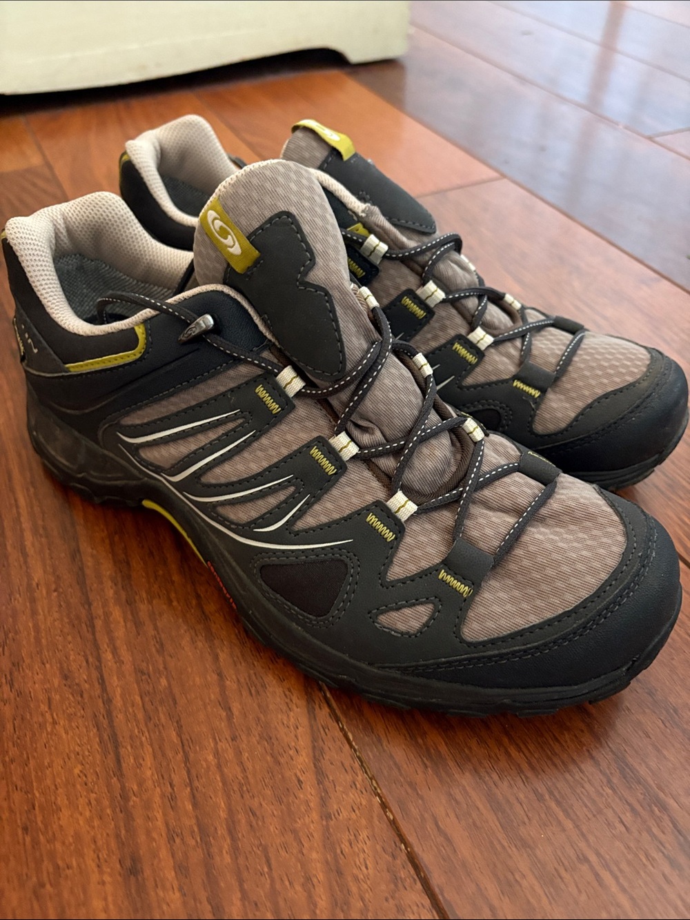 Women’s Salomon size 9.5 Hiking Trail Sneakers - Tan and Black with Lime Accents